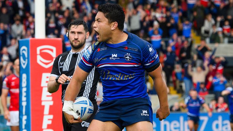 Wakefield's Mason Lino celebrates scoring the winning try