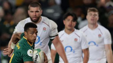 South Africa's scrum-half Grant Williams runs to score a try during the rugby Nations Championship match between South Africa and England at Ellis Park Stadium in Johannesburg on July 4, 2026. (Photo by PHILL MAGAKOE / AFP)