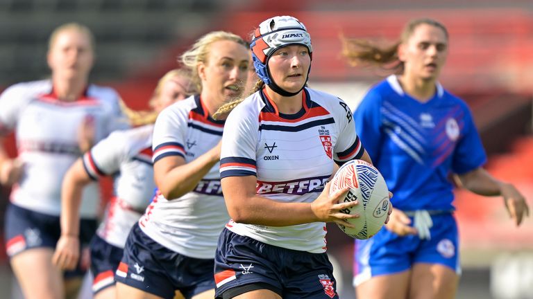 Isabel Rowe runs with the ball as England women won their mid-season international against France