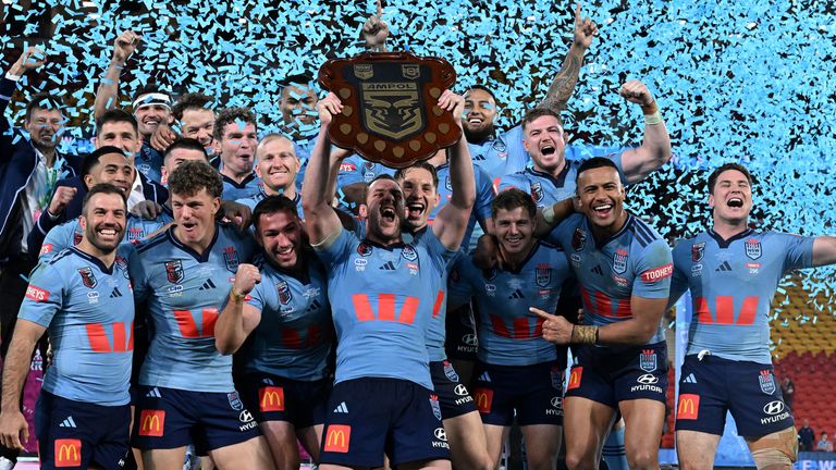 New South Wales celebrate a famous win on Queensland turf 