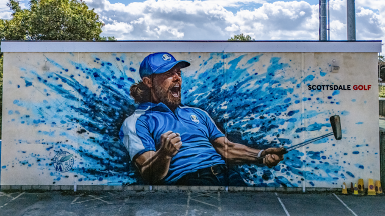 A mural of Tommy Fleetwood by artist Paul Curtis is on the side of the Southport and Ainsdale Sports Club