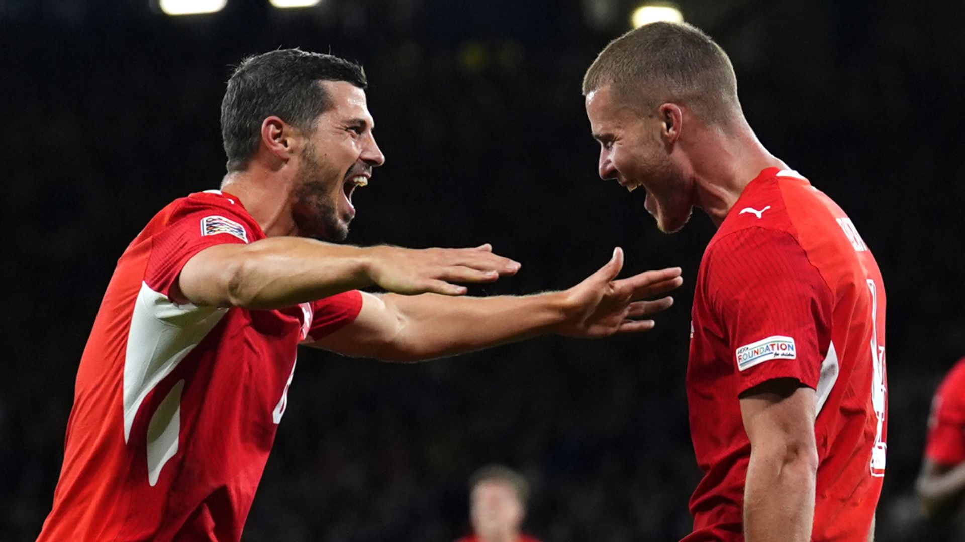 Switzerland two up against 10-man Scotland LIVE!