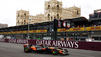 Lando Norris heads into Turn One in 2025
