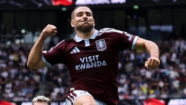 Emi Buendia leaps in celebration after scoring Aston Villa's third goal against Spurs