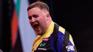 Littler celebrates during his victory over Aspinall (credit: Kelly Deckers/PDC)