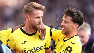 Kristoffer Ajer celebrates after Brentford level the game against Aston Villa