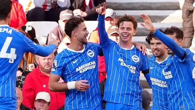Brighton's Maxim De Cuyper celebrates with team-mates after scoring the opening goal