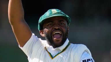 South Africa's captain Temba Bavuma celebrates as team-mate Wiaan Mulder bowled Australia's Scott Boland