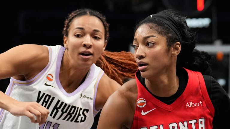 Atlanta Dream's Angel Reese goes up to shoot against Golden State Valkyries' Kiah Stokes